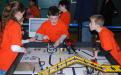 Members of the East Rockaway "Rockbots" - Team #2948 prepare to program their robot for the course at the February 28 Long Island LEGO League Tournament. Five hundred students from 48 teams participated in the event.